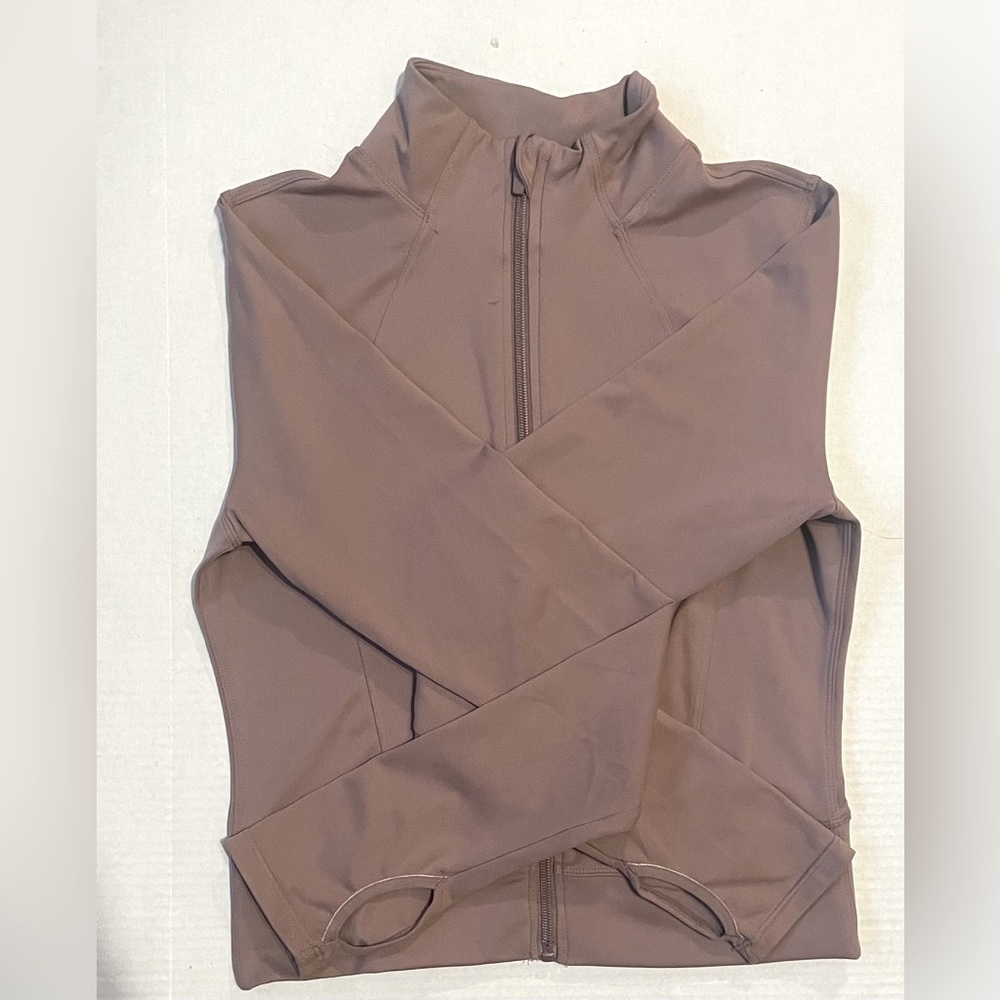 Cropped mauve pink running jacket with thumb holes
